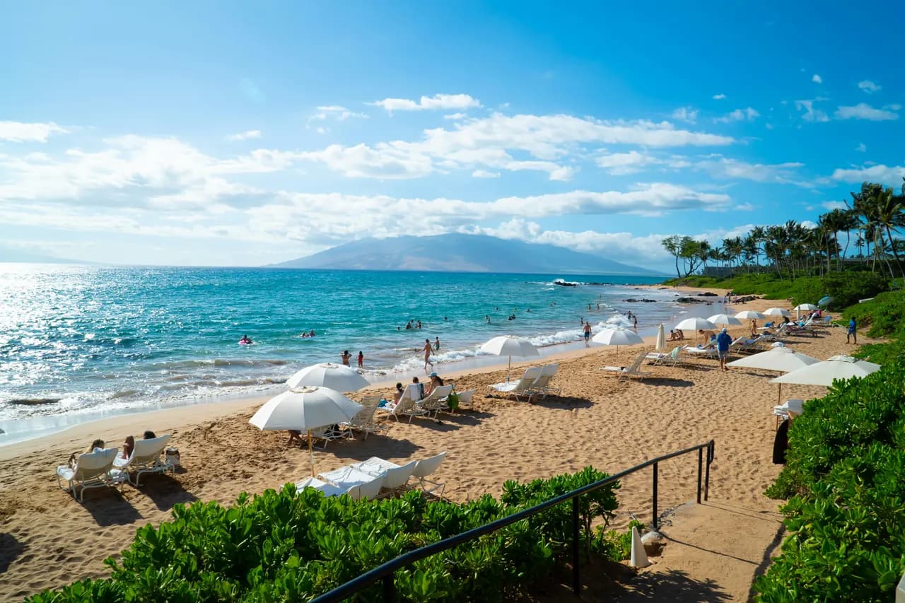 Beach umbrellas on the Maui coast near South Maui resort areas